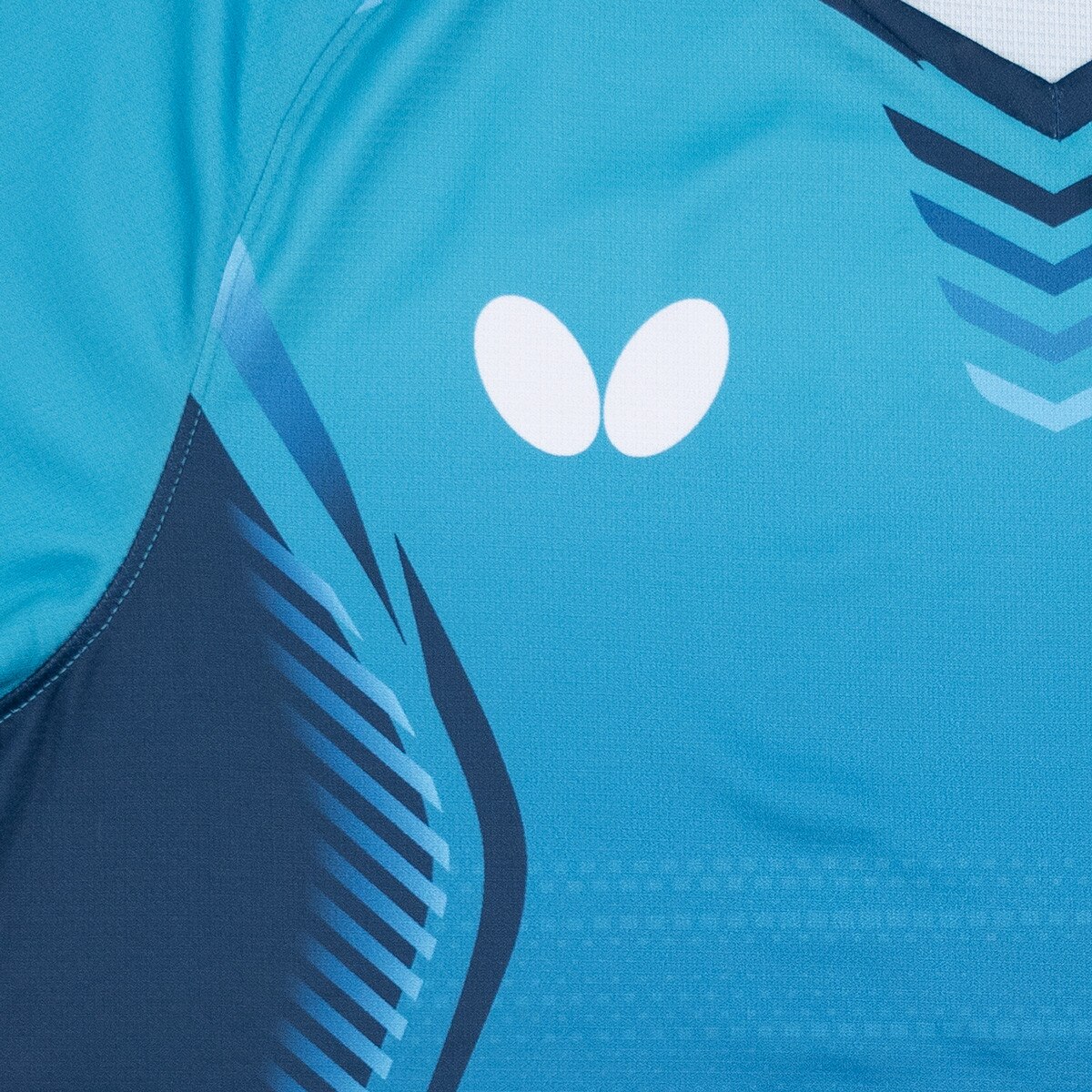 Butterfly Playce Shirt - Turquoise Logo Close Up